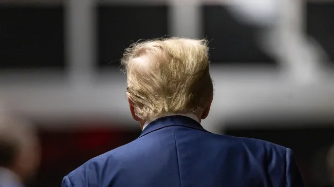 Donald Trump walking into court
